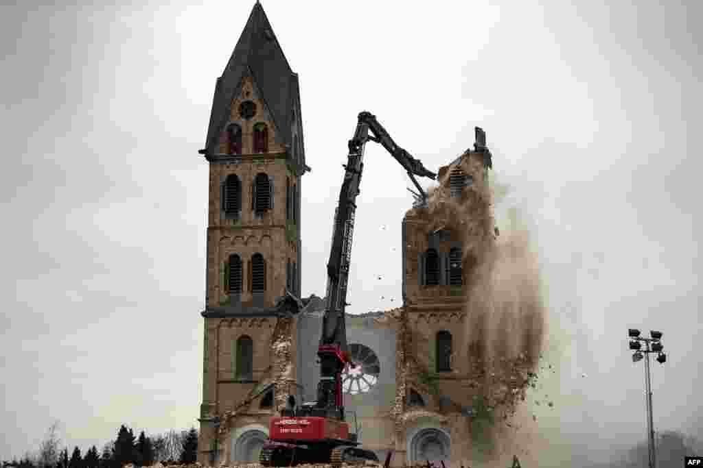 The desacralized St. Lambertus church in Erkelenz-Immerath, western Germany, is being demolished in order to make possible brown coal surface mining. Residents from the village of Immerath were relocated previously, as the area is to be exploited by German energy supplier RWE Power in an extension of their Tagebau Garzweiler open pit lignite mine.