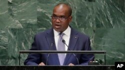 FILE - Burkina Faso Foreign Minister Alpha Barry addresses the U.N. General Assembly, Sept. 29, 2018, at U.N. headquarters. 