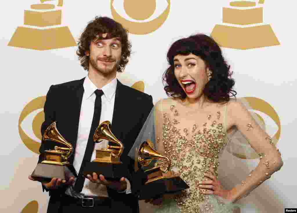 Gotye poses with his Grammy awards for Best Pop Duo/Group Performance with Kimbra (R) and for Best Alternative Music Album, backstage at the 55th annual Grammy Awards in Los Angeles, California Feb. 10, 2013.