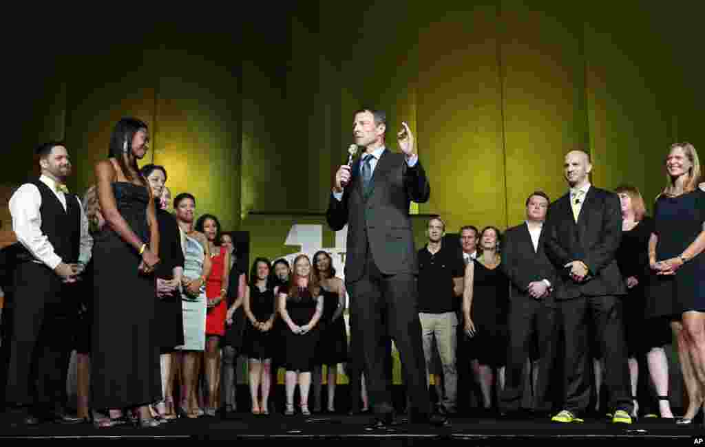 Lance Armstrong stands onstage during the 15th anniversary celebration for the Livestrong charity, October 19, 2012, in Austin, Texas. Armstrong said he has been through a "difficult couple of weeks" and urged supporters of the charity to stand behind its mission.