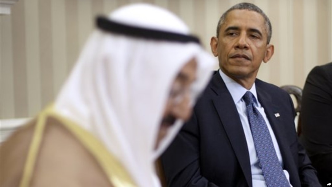President Barack Obama meets with the emir of Kuwait, Sheik al Ahmad Jaber al-Sabah, in the Oval Office of the White House in Washington, Sept. 13, 2013.
