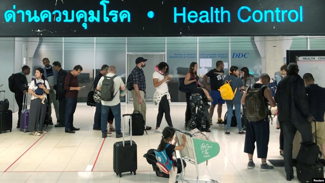 Tourist line-up in a health control at the arrival section at Suvarnabhumi international airport in Bangkok, Thailand, Januaruy 19, 2020