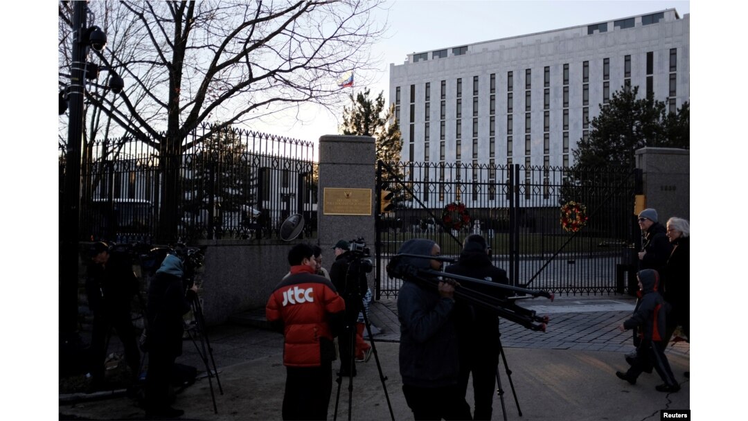 Television crews assemble outside the Russian Embassy on Wisconsin Avenue in Washington, U.S., Dec. 29, 2016.