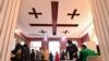People visit a polling station to vote in Georgia's parliamentary election in Tbilisi on Oct. 31, 2020.