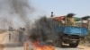 A truck passing a partial roadblock setup by residents as a protest against the Islamist Al-Shabab insurgent group, in Tobanka Buundo in the lower Shabelle region, near the Somalian capital Mogadishu, March 6, 2014.