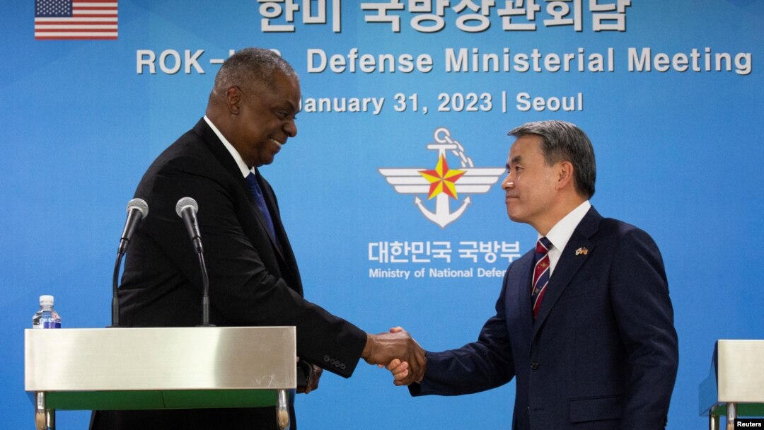 U.S. Secretary of Defense Lloyd Austin shakes hands with South Korean Defense Minister Lee Jong-sup after a joint press conference at the Defense Ministry in Seoul, South Korea Jan. 31, 2023.