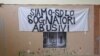 A banner reading "We are just unauthorized dreamers" is attached to the wall of the committee for “Le Vele di Scampia,” (the Sails of Scampia), a public housing project which for over a decade was the center for the Camorra Mafia syndicate's drug business, in Naples, southern Italy, Feb. 12, 2018. Whichever party can convert voters’ palpable anger in the south into support in Italy’s March 4 election could very well determine who governs Italy. A few dozen southern races, including in the Campania region embracing Naples, are critical. 