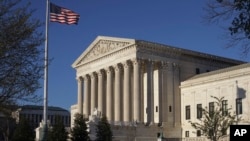 FILE - The Supreme Court building is seen in Washington, D.C, April 4, 2017. In an era of deep partisan division, the court could soon decide whether the drawing of electoral districts can be too political.