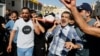 Mourners carry a body during the funeral of Palestinians who were killed in an airstrike during an Israeli raid, in Tubas in the Israeli-occupied West Bank, Sept. 13, 2024. 