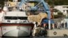 Court halts Italy’s contested migrant centers in Albania