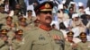 FILE - Pakistan's newly appointed army chief General Raheel Sharif attends the change of command ceremony in with outgoing army chief General Ashfaq Kayani (not in picture) at army headquarters in Rawalpindi, Nov. 29, 2013.