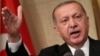 Turkish President Tayyip Erdogan says he will not back down to Washington's demand to release American Pastor Andrew Brunson, who is on trial on terrorism charges. 