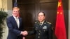 Acting U.S. Defense Secretary Patrick Shanahan and Chinese Defense Minister Wei Fenghe meet before the start of their meeting in Singapore on the sidelines of the Shangri-La dialogue, May 31, 2019.