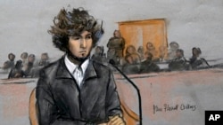 FILE - A courtroom sketch depicts Boston Marathon bombing suspect Dzhokhar Tsarnaev sitting in federal court in Boston, Massachusetts, Dec. 18, 2014.