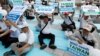 FILE - Protesters take part in a rally in Taipei against Taiwan being excluded from U.N.'s annual World Health Assembly in Geneva, May 21, 2017.