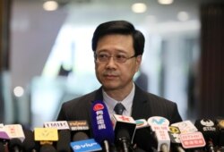 Secretary of Security John Lee Ka-Chiu announces the withdrawal of the extradition bill, in Hong Kong, Oct. 23, 2019.
