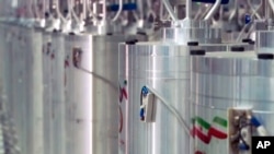 In this image made from April 17, 2021, video released by the Islamic Republic Iran Broadcasting, IRIB, state-run TV, various centrifuge machines line the hall damaged on April 11, 2021, at the Natanz Uranium Enrichment Facility.
