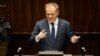 Прем’єр-міністр Польщі Дональд Туск виступає перед Сеймом, нижньою палатою парламенту, у Варшаві, 7 березня 2025 року. (Фото: AP Photo/Czarek Sokolowski)