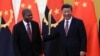 João Lourenço (esq.) e Xi Jinping (dir) em Pequim
