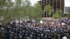 Iranian demonstrators chant slogans in front of the Saudi Embassy in Tehran to protest alleged abuse of two male Iranian pilgrims in Saudi Arabia, April 11, 2015.