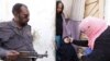 A girl receives polio vaccine drops at the door step of her family home in Karachi, Pakistan, February 15, 2016. 