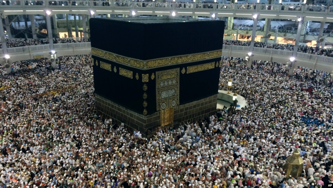 FILE - Muslim pilgrims circle the Kaaba, the black cube at center, inside the Grand Mosque during the annual pilgrimage, known as the hajj, in the Muslim holy city of Mecca, Saudi Arabia. 