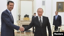 Башар Асад і Володимир Путін у Москві