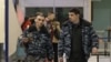Medvedev fojeada xavfsizlik xizmatini aybladi, muhojirlar xavotirda
