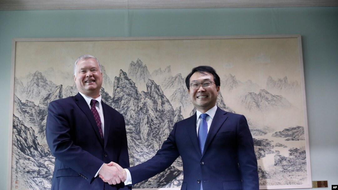 U.S. special envoy for North Korea Stephen Biegun, left, pose with his South Korean counterpart Lee Do-hoon during their meeting at the Foreign Ministry in Seoul, South Korea, Wednesday, Aug. 21, 2019.