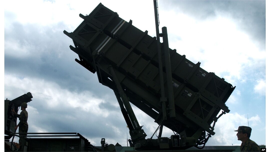 Taiwanese soldiers perform a launch preparation exercise on one of Taiwan's many Patriot missile air defense systems Friday, Oct. 22, 2004