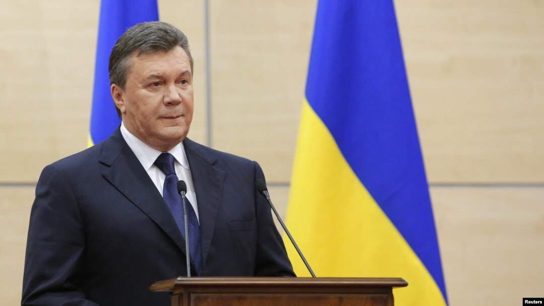 FILE - Ousted Ukrainian president Viktor Yanukovych makes a statement during a news conference in the southern Russian city of Rostov-on-Don, March 11, 2014. 