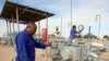 IEA Revises World Oil Demand Growth Sharply Lower