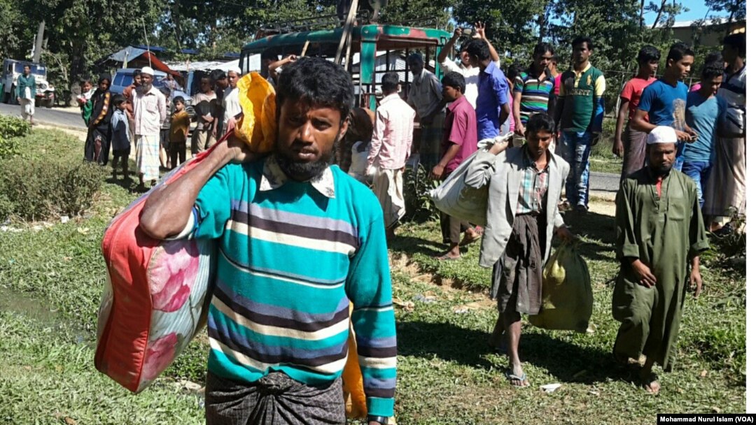 Rohingya men have just arrived from Myanmar, at an unidentified place in Cox's Bazar district, Bangladesh. 