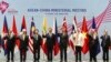 ASEAN and China foreign ministers pose for a photo ahead of the ASEAN-China Ministerial Meeting on the sidelines of the 51st ASEAN Foreign Ministers Meeting in Singapore, Aug. 2, 2018. 