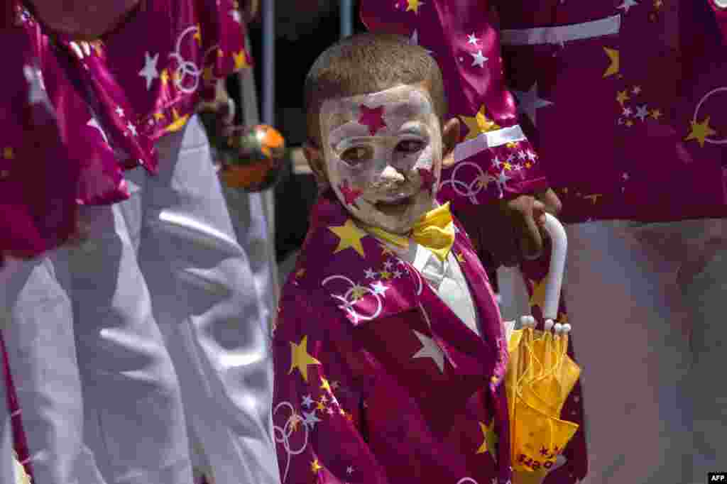 A member of a minstrel troupe marches in the city center of Cape Town during the annual Tweede Nuwe Jaar (Second New Year) Cape Town Minstrels Carnival.