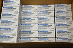 FILE - Boxes of the Johnson & Johnson COVID-19 vaccine are seen at the McKesson Corp., amid the coronavirus disease outbreak, in Shepherdsville, Ky., March 1, 2021.
