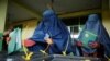 Afghan women cast ballots at local polling station, Kabul, April 5, 2014.