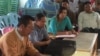 ဖားကန့်မြို့နယ် ဆိပ်မူကျေးရွာ ရာအိမ်မှူး ဒေါ်နန္ဒာလှိုင် ကို ရပ်ကွက်အုပ်ချုပ်ရေး အစည်းအဝေးတွင်တွေ့ရစဉ် (သတင်းဓါတ်ပုံ- Zaw Moe Htet) 