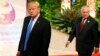 FILE - U.S. President Donald Trump, accompanied by Secretary of State Rex Tillerson, is pictured in Manila, Philippines, site of an ASEAN summit, Nov. 14, 2017.
