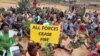 Women protest in Bamenda, Cameroon, in response to a Sept. 3, 2018, attack on the local Presbyterian School of Science and Technology, where six students were abducted.