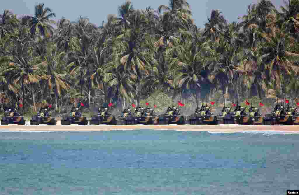 Myanmar military troops take part in a military exercise at Ayeyarwaddy delta region, Feb. 3, 2018.