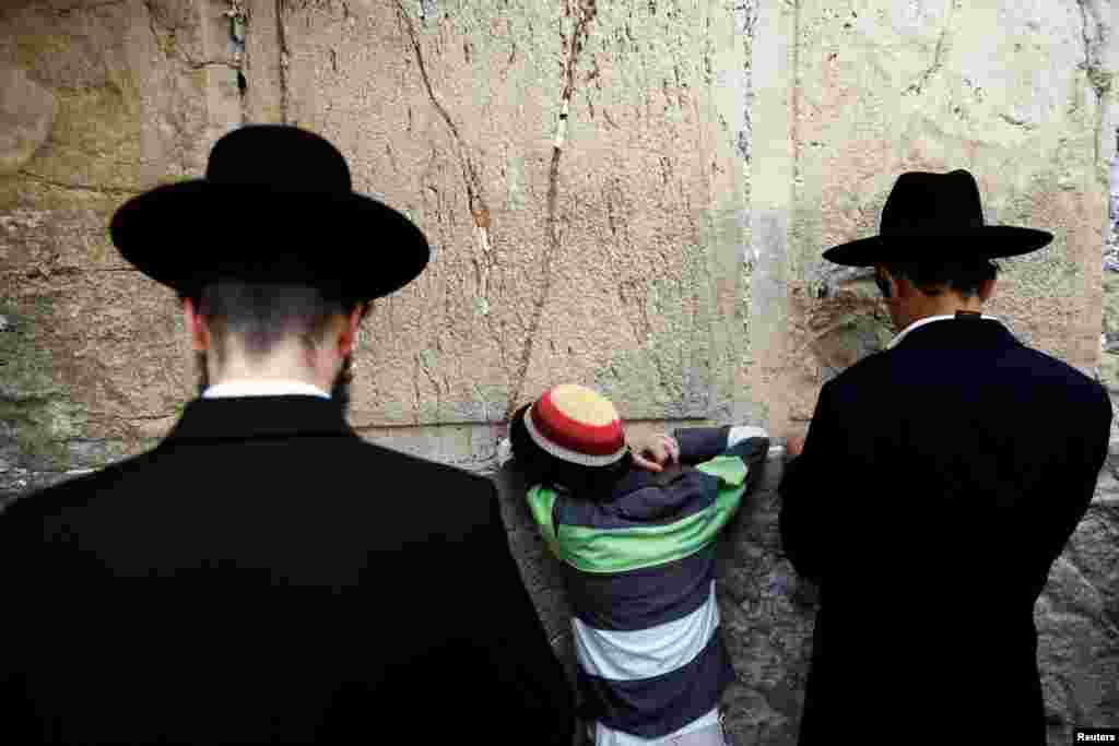 Religious Jews attend a special prayer for rain at the Western Wall in Jerusalem's Old City.