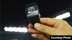 The referee watches connect instantly with electronic eyes on the goal line. (Michael Regan/FIFA via Getty Images)