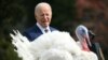 US President Joe Biden takes part in the National Thanksgiving Turkey pardon on the 76th anniversary of the National Thanksgiving Turkey presentation on the South Lawn of the White House in Washington, DC, on November 20, 2023. (Photo by Mandel NGAN / AFP
