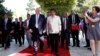 Israeli President Reuven Rivlin, left, walks along his Philippine counterpart Rodrigo Duterte as they meet in Jerusalem, Israel, Tuesday, Sept. 4, 2018. 