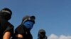 Reports: Hong Kong to Consider Banning Protesters from Wearing Face Masks