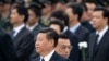 中国总理李克强（右）在2014年9月20日与中国国家主席习近平在天安门广场人民烈士纪念碑前面。