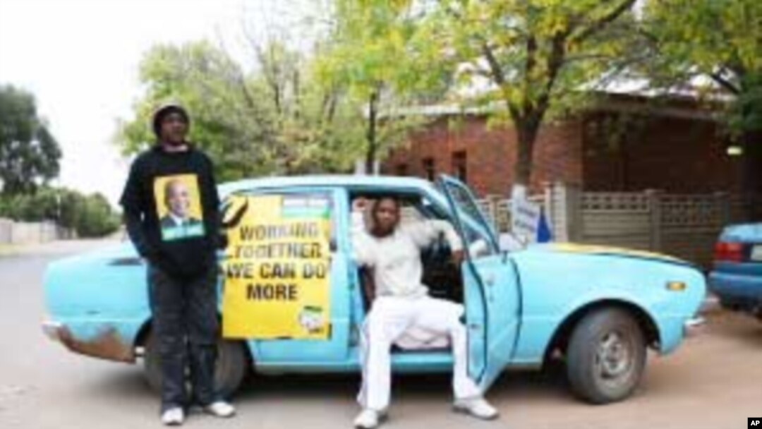 For ANC official Pitso Marumo (seated) and his colleague, Maboza Ledaka, the spirit of South Africa's 2009 election lives on