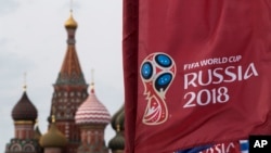 FILE - A flag with the logo of the World Cup 2018 is on display in Moscow, Russia, June 4, 2018. 
