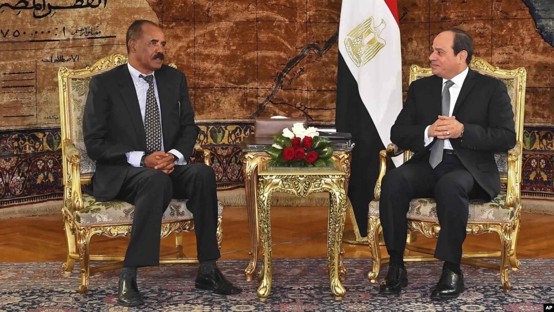 In this photo provided by Egypt's state news agency, MENA, Eritrean President Isaias Afwerki, left, meets with Egyptian President Abdel-Fattah el-Sissi at the presidential palace, in Cairo, Egypt, Jan. 9, 2018. 